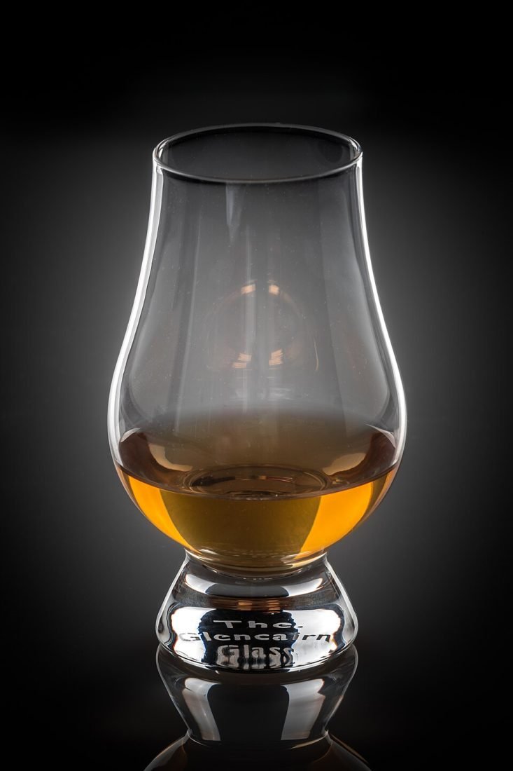 The Glencairn glass, designed for whisky. The tulip shape gathers the aroma and brings it up to your nose.